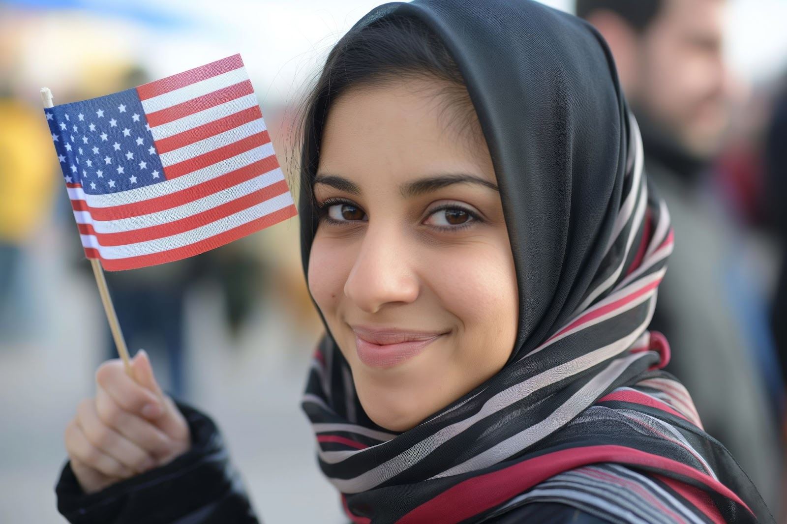 a women holding an American flag